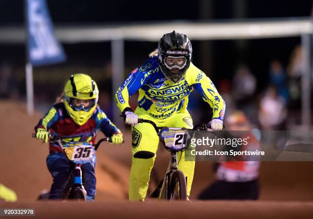 Ssquared Bicycles' Lauren Reynolds of Australia leads Supercross BMXs Rachel Mydock through the third straight during Elite Women's action at the USA...