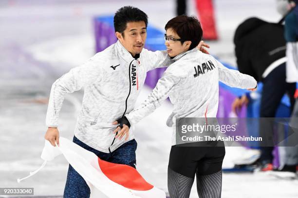 Gold medalist Nao Kodaira of Japan celebrates with her coach Masahiro Yuki after competing in the Speed Skating Ladies' 500m on day nine of the...