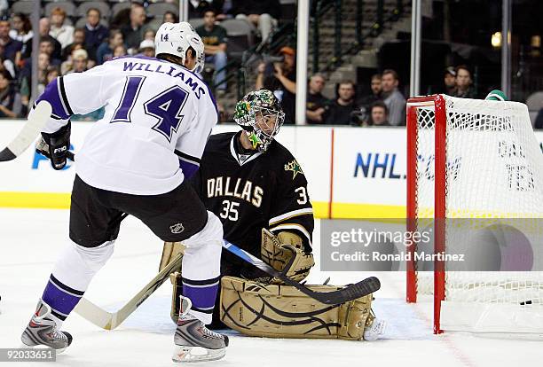 Goaltender Marty Turco of the Dallas Stars gives up a goal to Justin Williams of the Los Angeles Kings at American Airlines Center on October 19,...