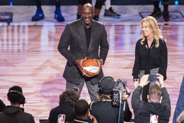Legend and Charlotte Hornets owner Michael Jordan is on stage during the unveiling of the 2019 NBA All-Star game logo and city, being hosted in...