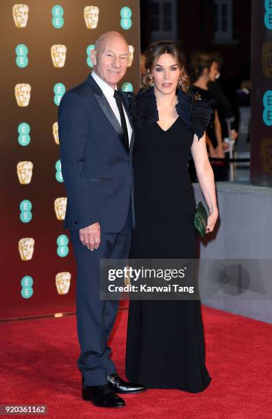 Patrick Stewart and Sunny Ozell attend the EE British Academy Film Awards held at the Royal Albert Hall on February 18, 2018 in London, England.