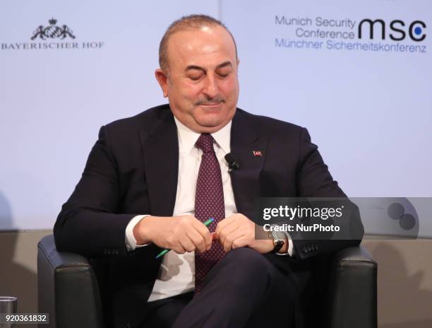 Mevlüt Cavusoglu waits before the beginning of the discussion. Turkey's minister of foreign affairs Mevlüt Cavusoglu, Lebanon's minister of national...