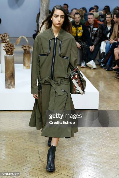 Model walks the runway at the JW Anderson show during London Fashion Week February 2018 at University of Westminster on February 16, 2018 in London,...