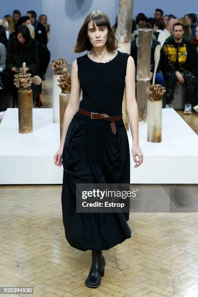 Model walks the runway at the JW Anderson show during London Fashion Week February 2018 at University of Westminster on February 16, 2018 in London,...