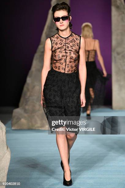 Model walks the runway at the Ashley Williams Ready to Wear Fall/Winter 2018-2019 fashion show during London Fashion Week February 2018 on February...