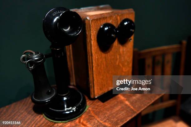 Candlestick Phone with Wooden Bell Box 1901-1908, on display in the Arts & Crafts Gallery at the Kirkland Museum of Fine & Decorative Art that is...