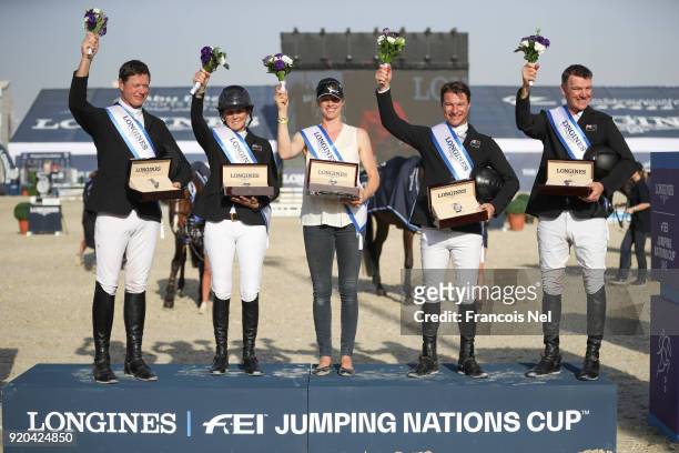 Winners Bruce Goodin, Ulrika Goodin, Samantha Mcintosh, Daniel Meech and Richard Gardner receive price on stage at the President of the UAE Show...