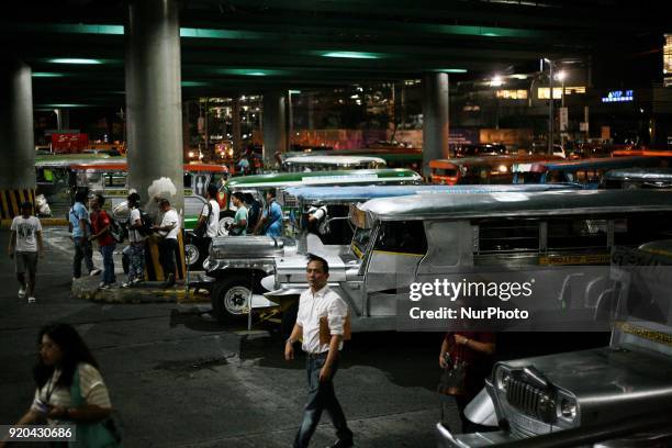 Fleets of jeepneys are seen at a loading bay in Manila, Philippines on Thursday, February 1, 2018. The Jeepney has become a symbol of Filipino...