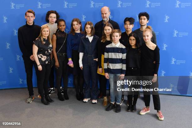 Actress Andrea Berntzen and film director Erik Poppe pose with cast members at the 'U - July 22' photo call during the 68th Berlinale International...