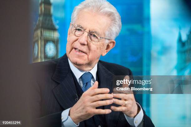 Mario Monti, former Italian prime minister, gestures while speaking during a Bloomberg Television interview in London, U.K., on Monday, Feb. 19,...