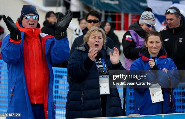 Prime Minister of Norway Erna Solberg celebrates the gold medal of Team Norway during the victory ceremony in Cross-Country Skiing Men's 4 x 10km...