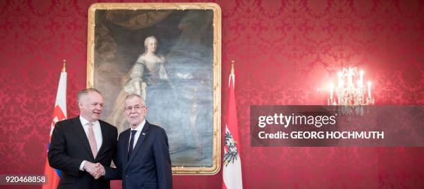 Austria's President Alexander van der Bellen and Slovakia's President Andrej Kiska shake hands at the beginning of a meeting in Vienna, Austria,...