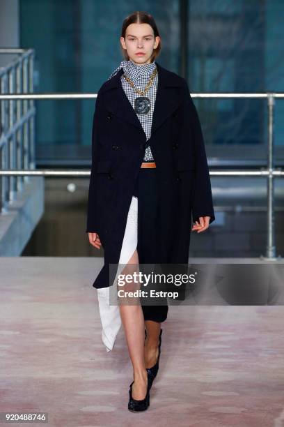 Model walks the runway at the Toga show during London Fashion Week February 2018 on February 17, 2018 in London, England.