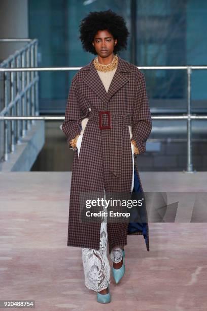 Model walks the runway at the Toga show during London Fashion Week February 2018 on February 17, 2018 in London, England.