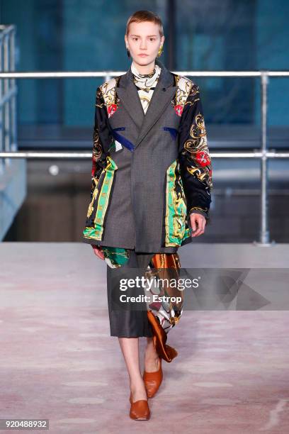 Model walks the runway at the Toga show during London Fashion Week February 2018 on February 17, 2018 in London, England.