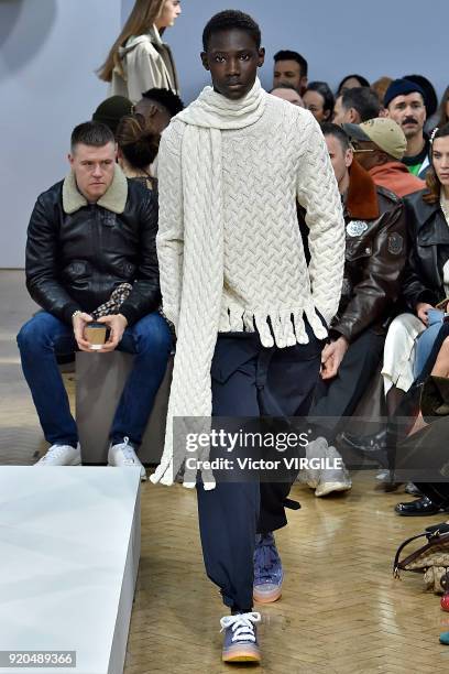 Model walks the runway at the JW Anderson Ready to Wear Fall/Winter 2018-2019 fashion show during London Fashion Week February 2018 on February 17,...