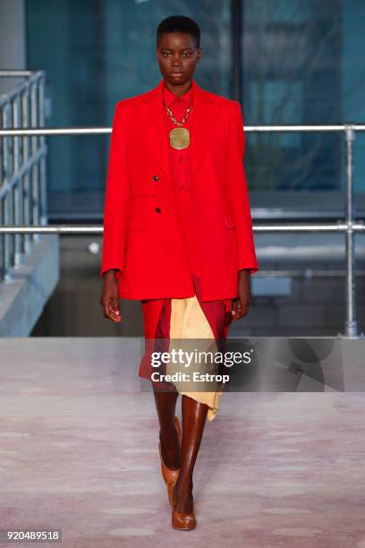 Model walks the runway at the Toga show during London Fashion Week February 2018 on February 17, 2018 in London, England.