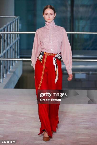 Model walks the runway at the Toga show during London Fashion Week February 2018 on February 17, 2018 in London, England.