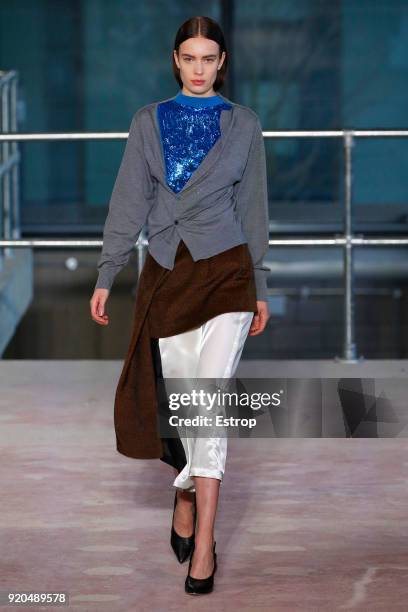 Model walks the runway at the Toga show during London Fashion Week February 2018 on February 17, 2018 in London, England.