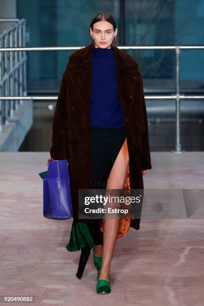 Model walks the runway at the Toga show during London Fashion Week February 2018 on February 17, 2018 in London, England.