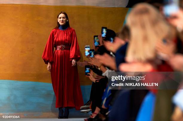 Serbian designer Roksanda Ilincic greets the audience at the end of her catwalk show on the fourth day of London Fashion Week Autumn/Winter 2018 in...