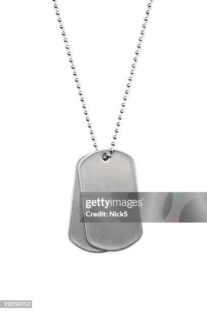 silver dog tags on a chain on a white background - dog tag stock pictures, royalty-free photos & images