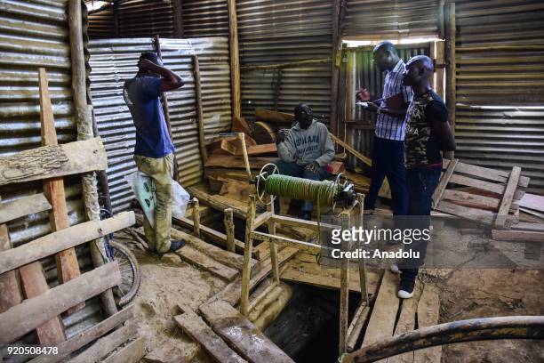 Mine workers prepare for work at a mine in Kakamega a western town of Kenya on February 16, 2018. Mine in Kakamega, which used to be run by British...