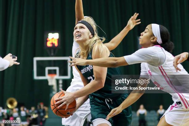 Green Bay Phoenix forward Jessica Lindstrom looks to shoot as Cleveland State Vikings guard Jade Ely defends during the first quarter of the women's...