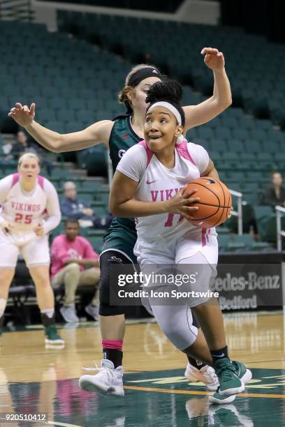 Cleveland State Vikings guard Khayla Livingston drives mto the basket past Green Bay Phoenix guard Laken James during the third quarter of the...