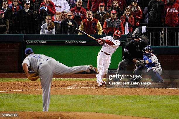 Jimmy Rollins of the Philadelphia Phillies hits a game-winning walkoff 2-run double in the bottom of the ninth inning to win 5-4 against Jonathan...