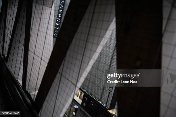 The company logo is seen on the exterior of a branch of the Debenhams chain of department stores on Oxford Street on February 19, 2018 in London,...