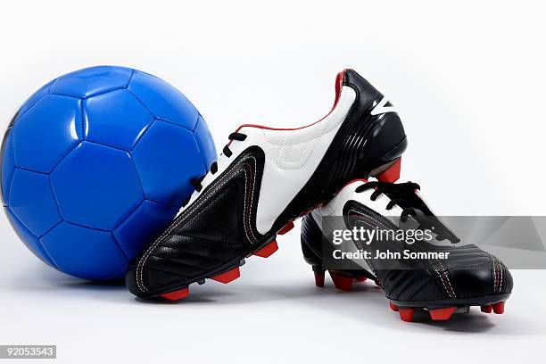 soccer ball and cleats - studded stock pictures, royalty-free photos & images