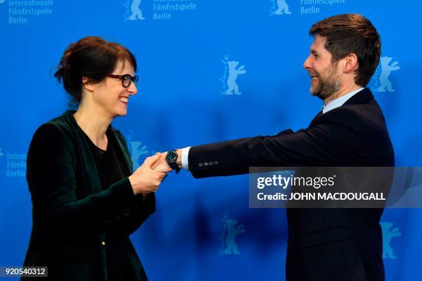 Swiss Producer Lionel Baier and French-Swiss Director and screenwriter Ursula Meier pose during a photo call for the film "Shock Waves - Diary of My...