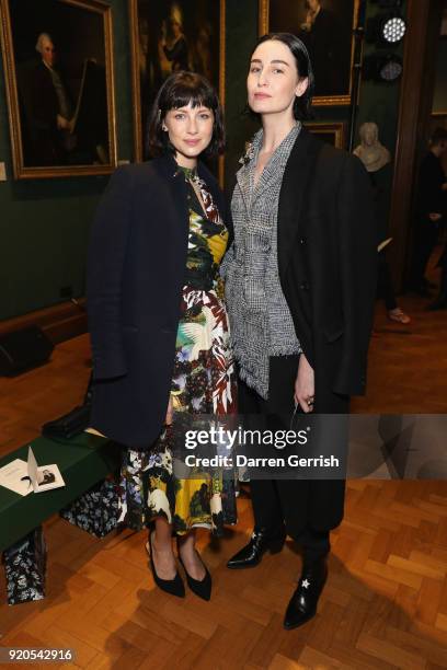 Erin O'Connor and Caitriona Balfe attend the ERDEM show during London Fashion Week February 2018 on February 19, 2018 in London, England.