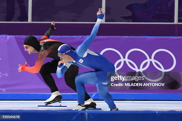 Canada's Laurent Dubreuil competes against South Korea's Kim Jun-Ho in the men's 500m speed skating event during the Pyeongchang 2018 Winter Olympic...
