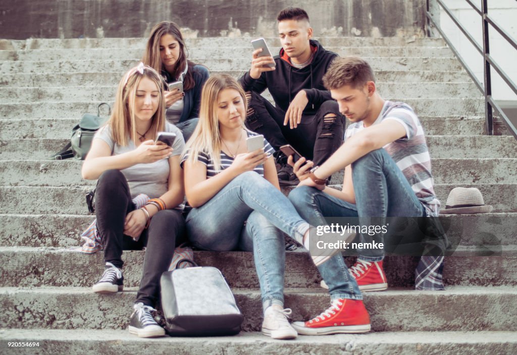 People Obsessed With Their Smartphones