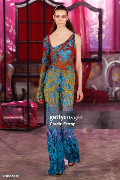 Model walks the runway at the Halpern show during London Fashion Week February 2018 on February 17, 2018 in London, England.