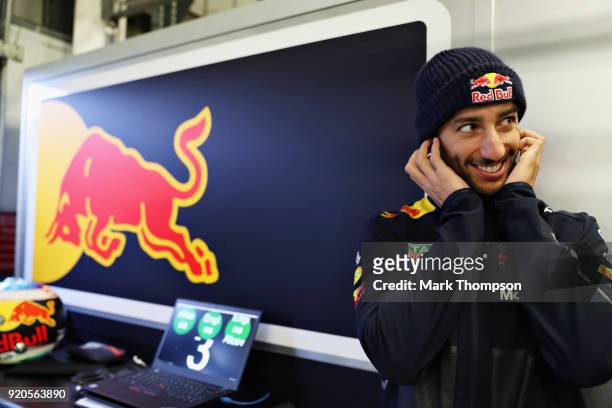 Daniel Ricciardo of Australia and Aston Martin Red Bull Racing looks on in the garage during the Aston Martin Red Bull Racing RB14 Special Edition...