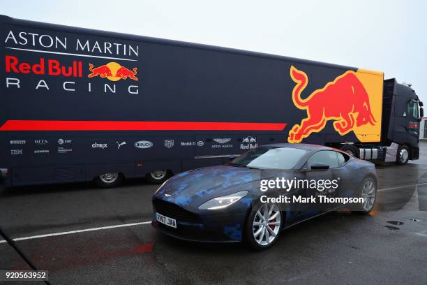 Daniel Ricciardo of Australia and Aston Martin Red Bull Racing arrives at the circuit in his Aston Martin DB11 before the Aston Martin Red Bull...