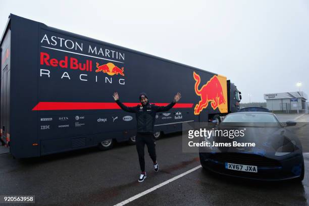 Daniel Ricciardo of Australia and Aston Martin Red Bull Racing arrives at the circuit in his Aston Martin DB11 before the Aston Martin Red Bull...