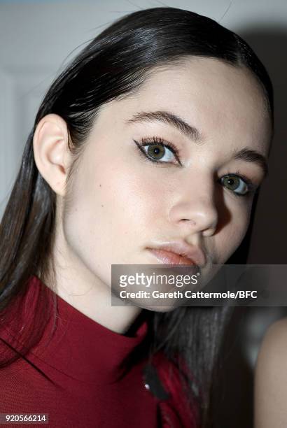 Model backstage ahead of the David Koma show during London Fashion Week February 2018 at St George's Church Bloomsbury on February 19, 2018 in...