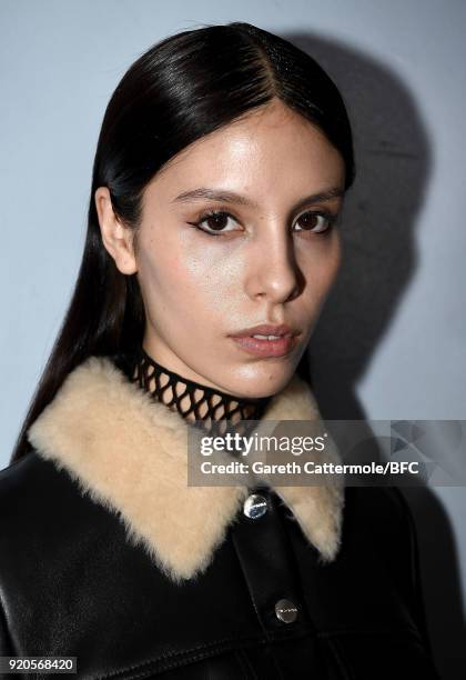 Model backstage ahead of the David Koma show during London Fashion Week February 2018 at St George's Church Bloomsbury on February 19, 2018 in...