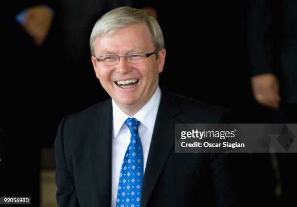Australian Prime Minister Kevin Rudd smiles before going inside the building during the Inauguration ceremony for President Yudhoyono at the House of...