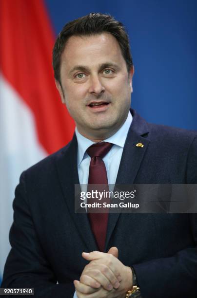 Luxembourg Prime Minister Xavier Bettel and German Chancellor Angela Merkel give statements to the media following talks at the Chancellery on...