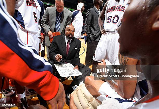 Head Coach Mike Woodson of the Atlanta Hawks discusses a play during a preseason game against the Washington Wizards on October 19, 2009 at Philips...