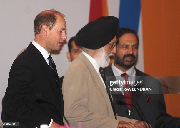 In this picture taken on October 12 Britain's Prince Edward, Earl of Wessex , Indian Sports Minister M.S. Gill , and Indian Olympic Association...