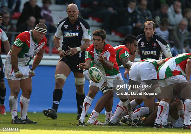 Dimitri Yachvili of Biarrtiz passes the ball during the Heineken Cup match between Biarritz Olympique and Gloucester at Parc de Sports Aguilera on...