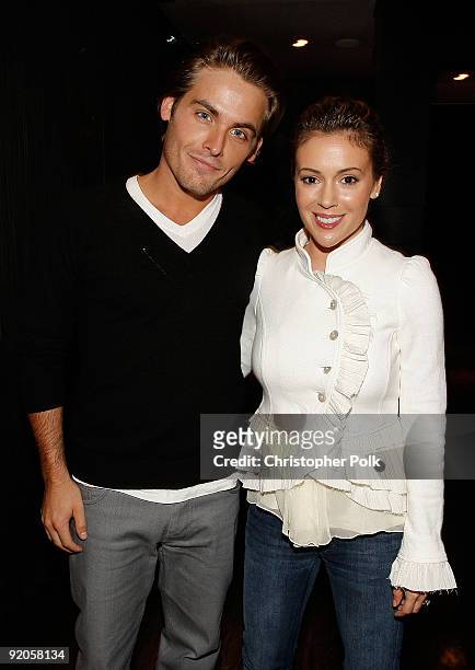 Actor Kevin Zegers and actress Alyssa Milano during the celebration for Laura Day�s new book �How to Rule the World from Your Couch� hosted by Ryan...