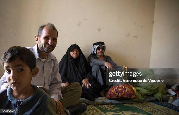 For three generations the men of this family have looked after the Ur archaeological site and its Ziggurat temple. Pictured here is Dahaf Mussein...