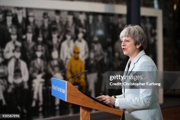 British Prime Minister Theresa May delivers a speech to students and staff during her visit to Derby College on February 19, 2018 in Derby, England....